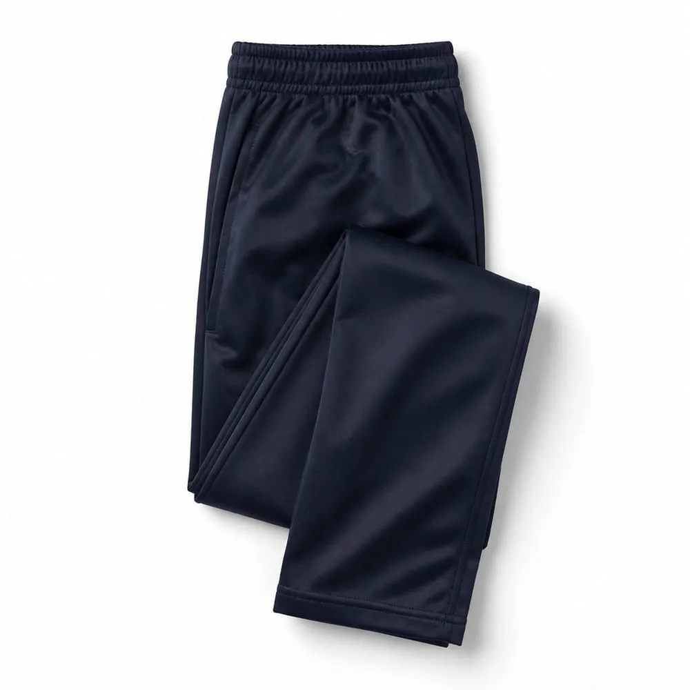 Pantalón de sudadera escolar azul oscuro en tela impermeable, doblado sobre fondo blanco